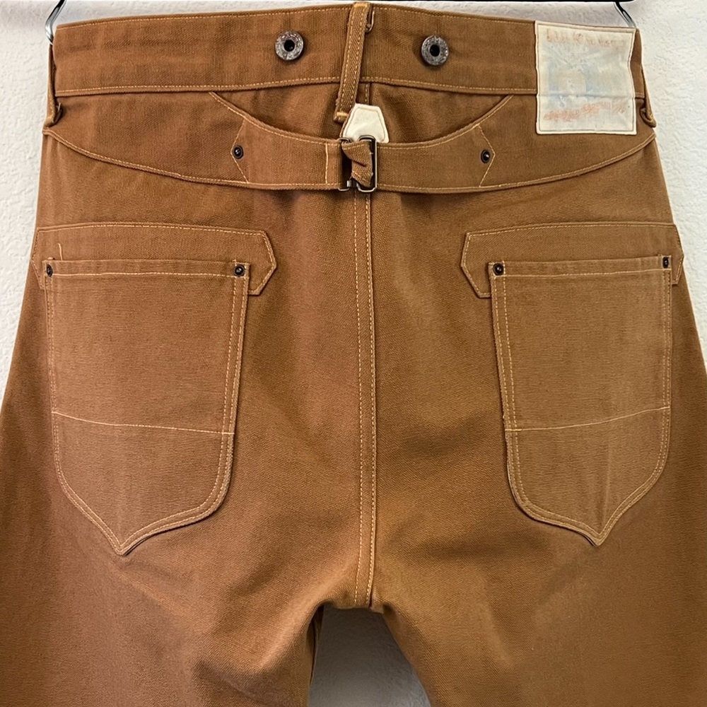 RISING SUN & CO. BROWN/DUCK CANVAS BUCKLE BACK PANTS. WAIST 35” INSEAM 33”